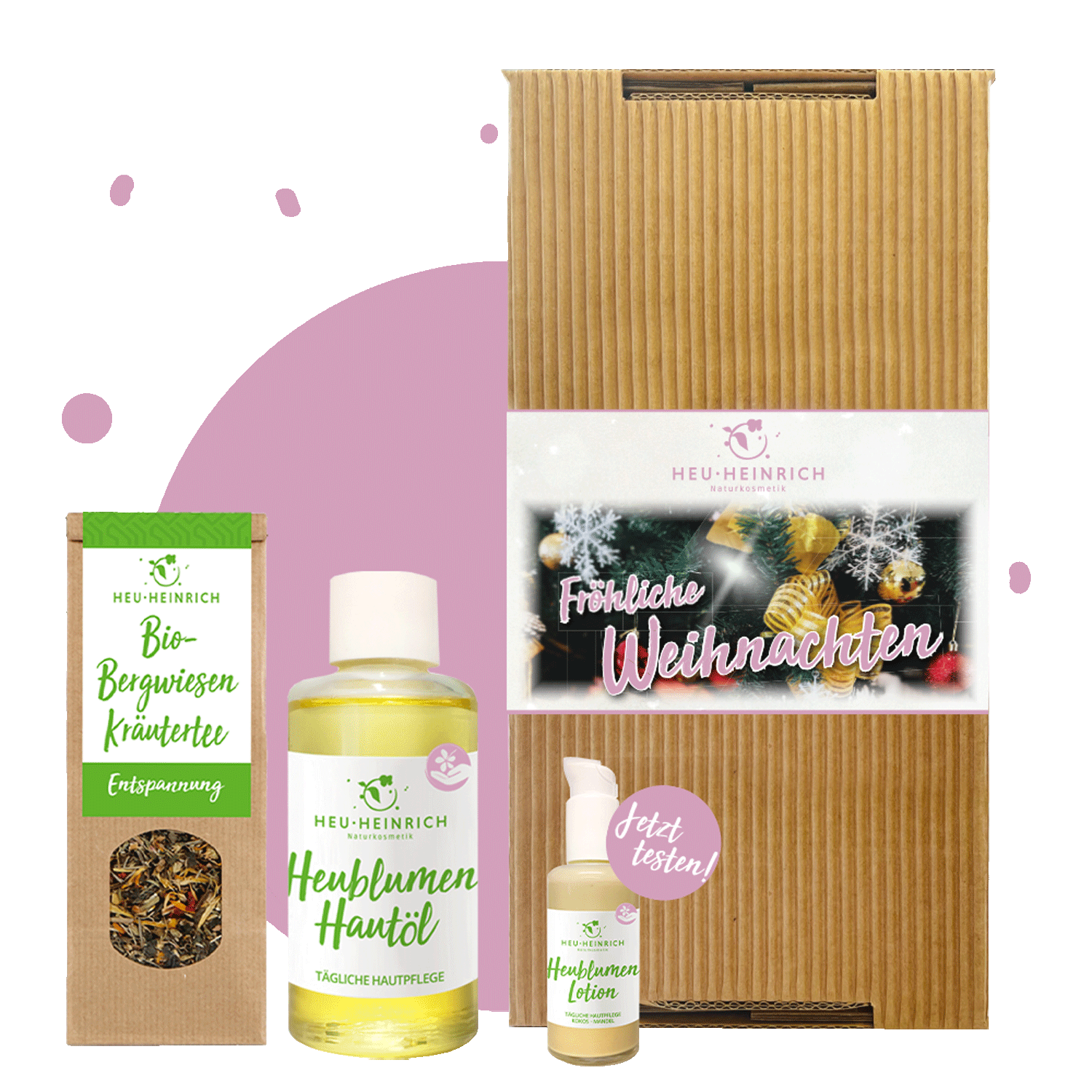 Zeigt das Set "Fröhliche Weihnachten" mit weihnachtlicher Verpackung, Bergwiesen Krätertee, Heublumen Hautöl und -Salbe. Im Hintergrund sieht man rosa Kreise