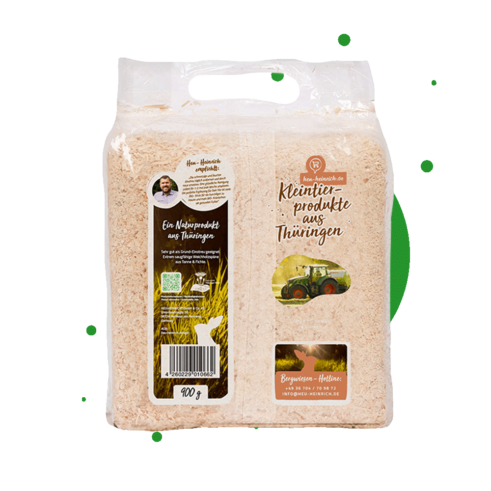 Heu-Heinrich Kleintierstreu 900 g – Rückseite der Verpackung mit Produktdetails und Anwendungshinweisen